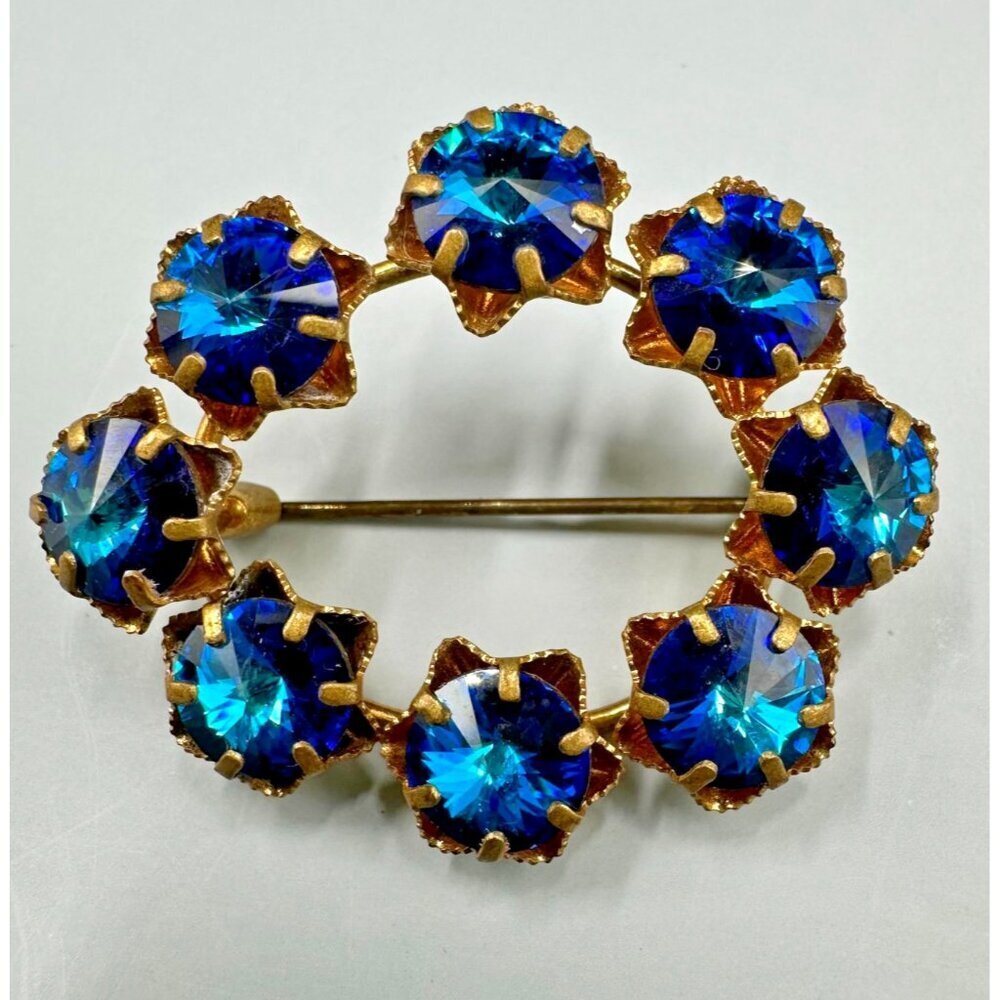 Vintage Austria Brooch Blue Rivoli Rhinestone Gold Tone Wreath Oval 1.25 Inch